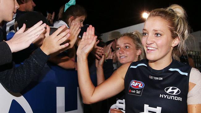 Jess Hosking (front) celebrates the win with fans. Pic: Getty Images