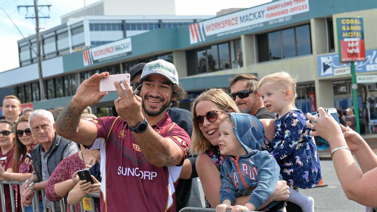 Johnathan Thurston poses for a photo with fans during an Origin fan day in Mackay. Picture: Madolyn Peters