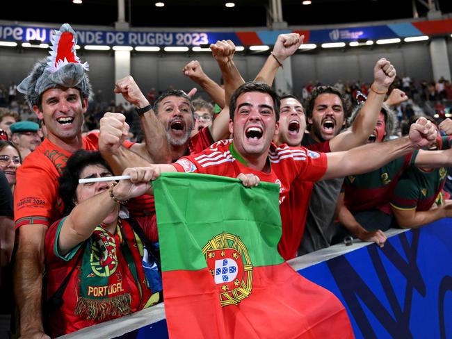 TOULOUSE, FRANCE - OCTOBER 08: Portugal fans celebrate their teams first ever World Cup victory after the Rugby World Cup France 2023 match between Fiji and Portugal at Stadium de Toulouse on October 08, 2023 in Toulouse, France. (Photo by Laurence Griffiths/Getty Images)