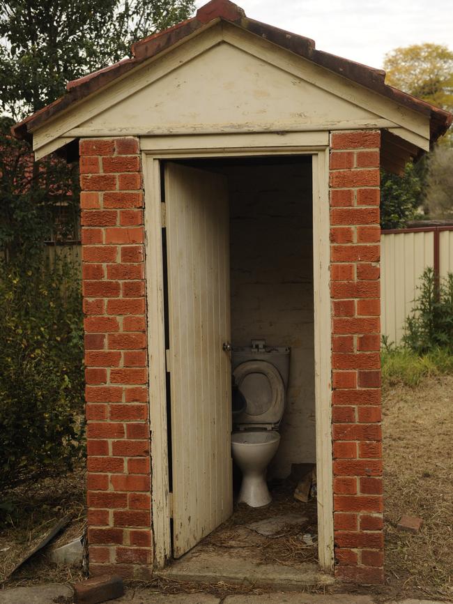 The bathroom facilities are broken and soaked in grime. Picture: Phil Rogers