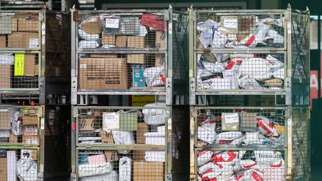 A man was arrested after allegedly stealing 67 packages in the mail. AAP/Russell Millard