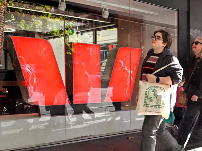 People walk past a branch of the Westpac bank in Melbourne on May 20, 2025, as the Reserve Bank of Australia (RBA) prepares to make it's monthly monetary policy decision on interest rates. (Photo by William WEST / AFP)