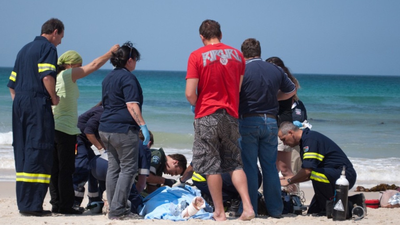 Paramedic crews on the scene as the young man received emergency treatment for his injuries. Picture: Caters News Agency