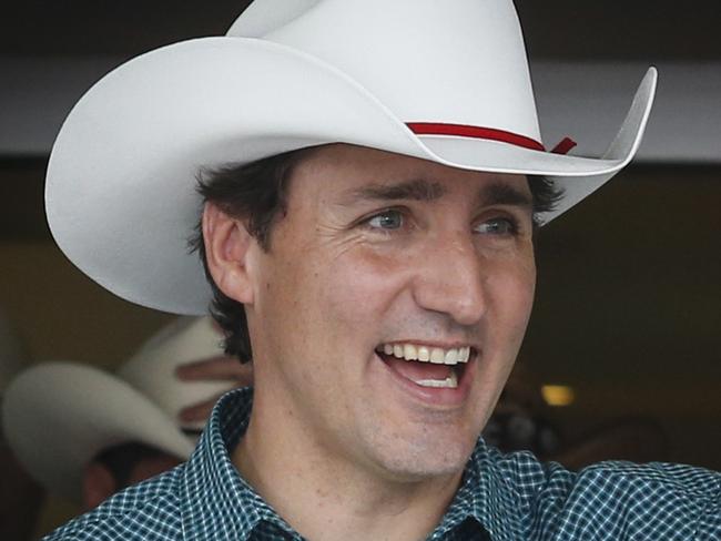 Canadian Prime Minister Justin Trudeau attends Stampede breakfast in Calgary, Alberta, Saturday, July 15, 2017. (Jeff McIntosh/The Canadian Press via AP)