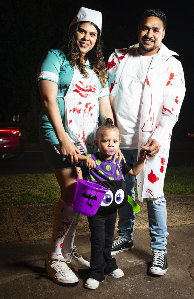 Felicity Sandy and Juliean Bligh take Jaala trick or treating on Halloween, Thursday, October 31, 2024. Picture: Kevin Farmer