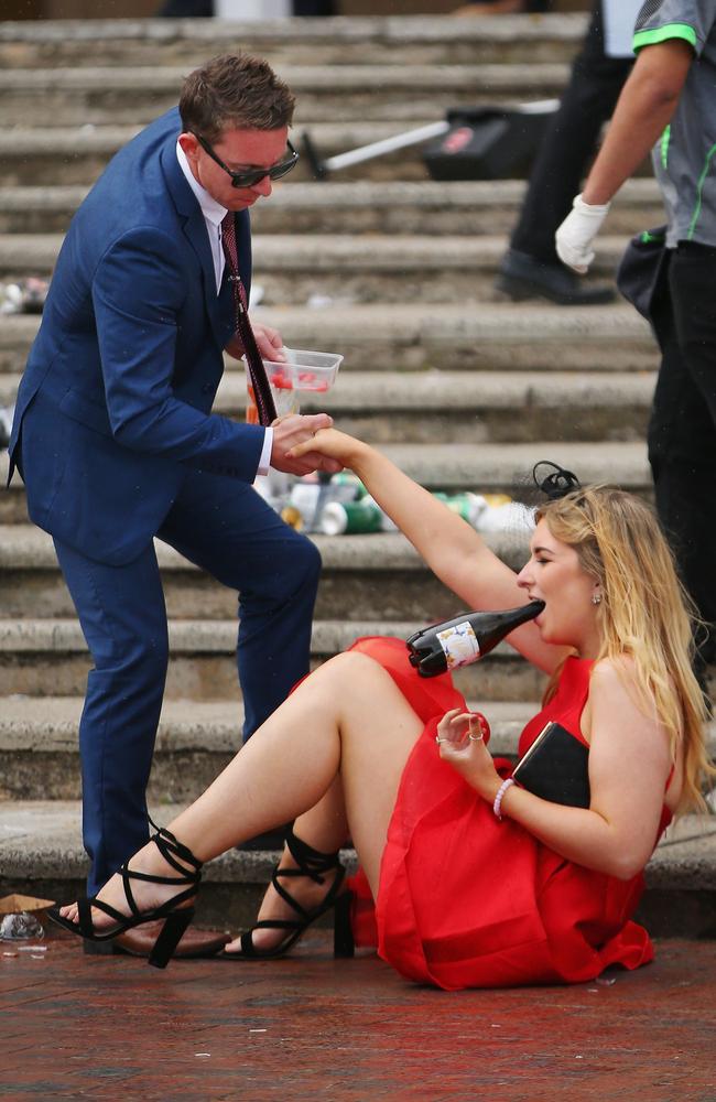 Racegoers enjoy the atmosphere on Melbourne Cup Day at Flemington Racecourse.