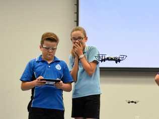 HANDS-ON: Gayndah State School students learn how to fly drones as SheMaps visits the region. Picture: Felicity Ripper