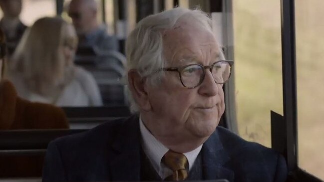 Old Mate sits on a bus into the Barossa.