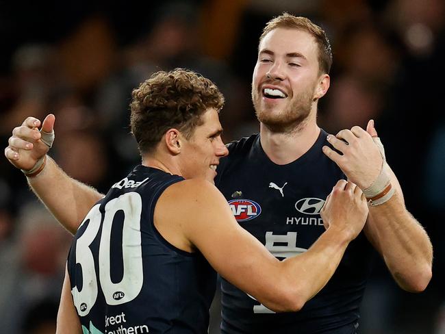 MELBOURNE, AUSTRALIA - MAY 08: Charlie Curnow (left) and Harry McKay of the Blues celebrate during the 2022 AFL Round 08 match between the Carlton Blues and the Adelaide Crows at Marvel Stadium on May 08, 2022 in Melbourne, Australia. (Photo by Michael Willson/AFL Photos via Getty Images)