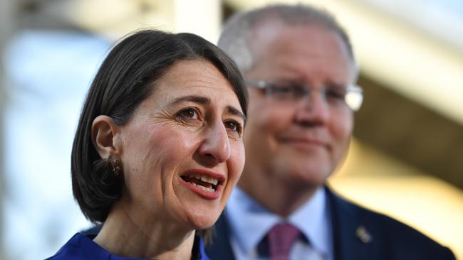 New South Wales Premier Gladys Berejiklian with Prime Minister Scott Morrison  during a visit to St. Mary's train station in Sydney, yesterday. Picture: AAP 