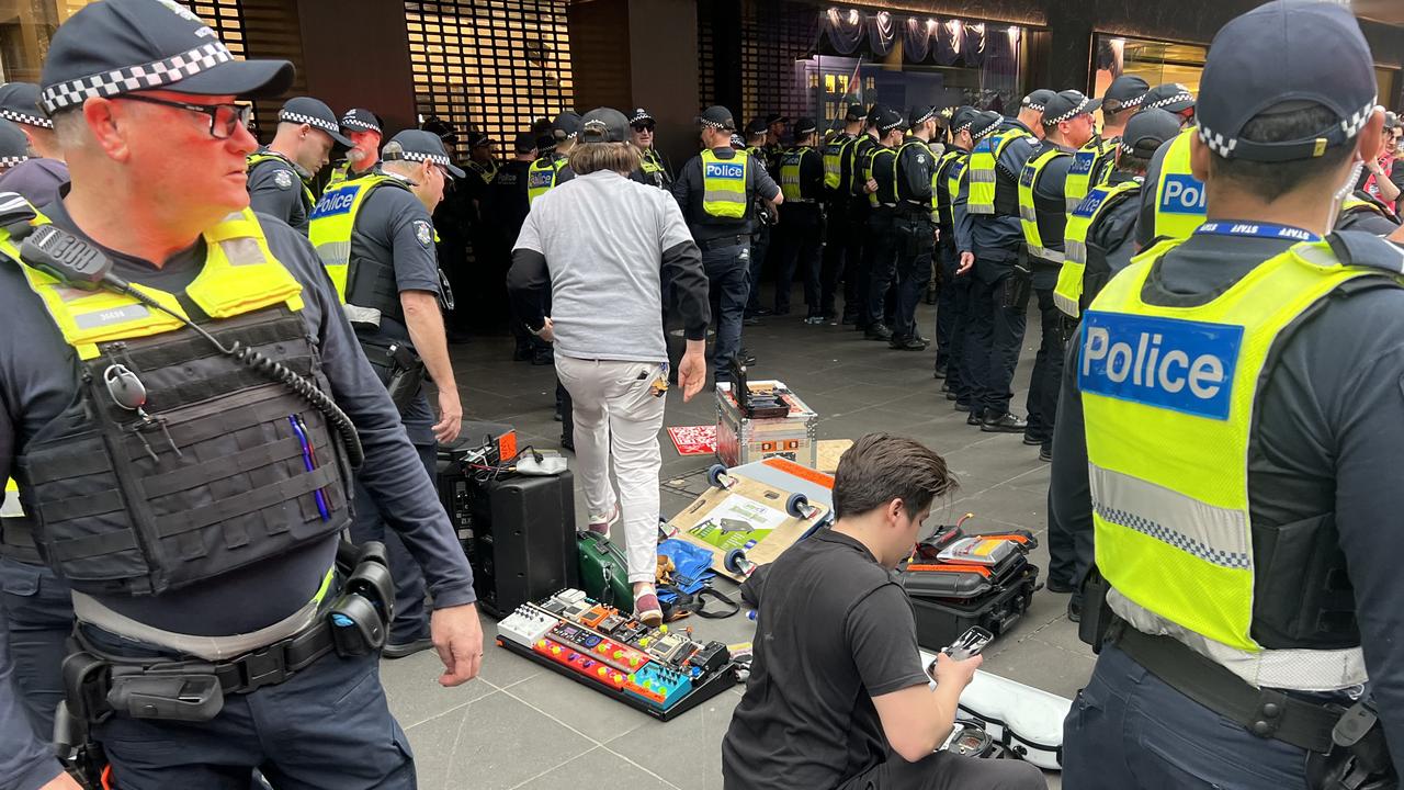 Chaos erupts as pro-Palestine protesters clash with busker in Bourke St