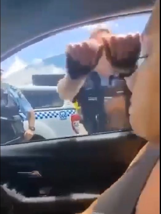 Coffs Harbour police were forced to break the window to arrest Helen Mary Delany, 52, who was allegedly wanted on two outstanding arrest warrants for domestic violence-related offences.