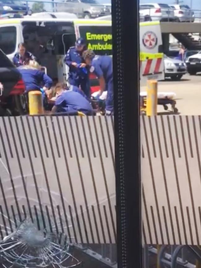 Paramedics and witnesses pictured on scene at Rockdale Fitness First after former bikie boss Mahmoud ‘Mick’ Hawi was shot in the car park. Picture: Supplied