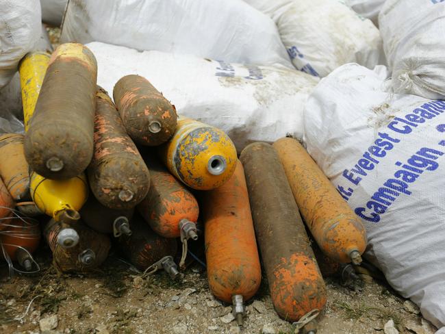 Sacks of garbage and empty oxygen cylinders are seen after being collected from Mount Everest. Picture: AP