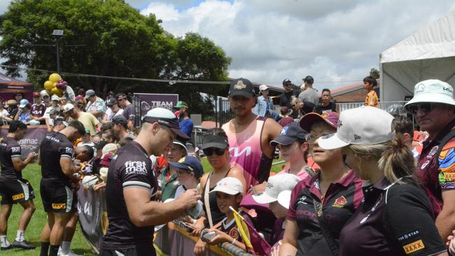 Billy Walters signs autographs at the Toowoomba Sports Ground on Saturday ahead an exhibition game between the Brisbane Broncos and the Gold Coast Titans on Sunday.