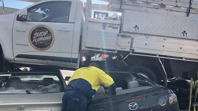 Two people were hurt when a ute landed on two cars at Pumicestone Rd, Caboolture, this morning.