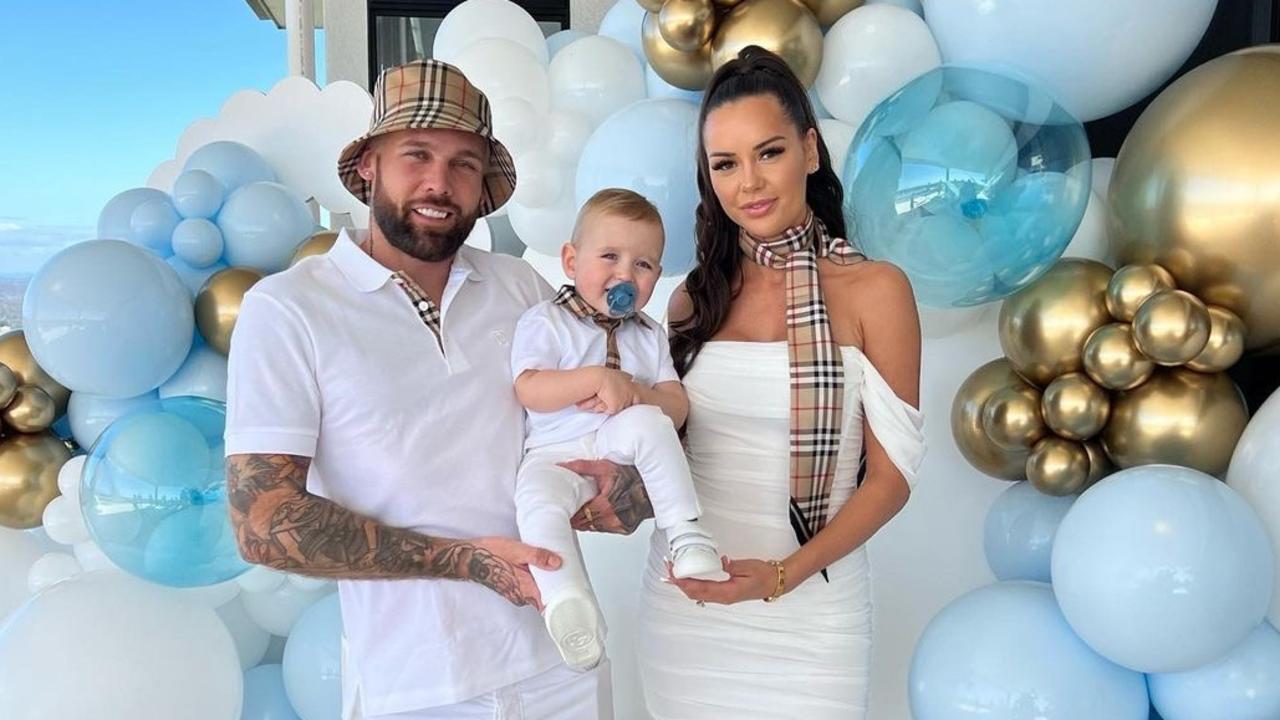 Troy 'Candy' Williams with wife, Anita Cassin, and their son, Saint, celebrating his first birthday in 2022