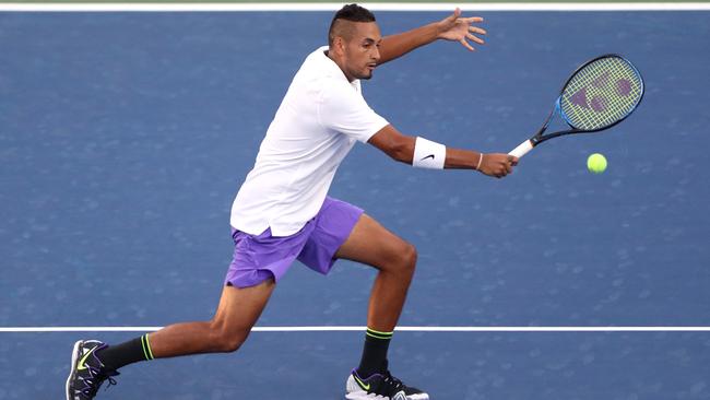 Nick Kyrgios volleys during the first set of his US Open second round match-up against Antoine Hoang. Picture: Getty Images