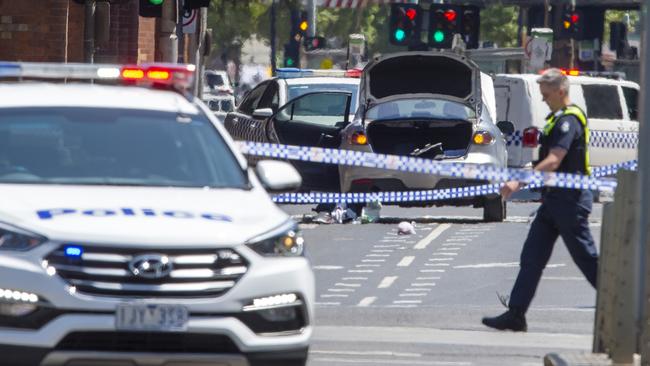 Police on the scene at Flinders St. Picture: Jay Town