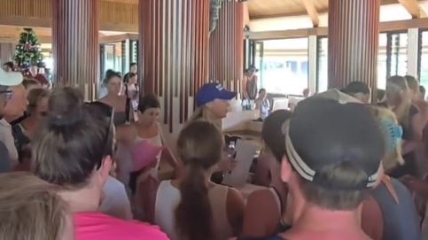 Australians gather at a Vanuatu resort lobby to get information about their evacuation flight. Picture: Supplied