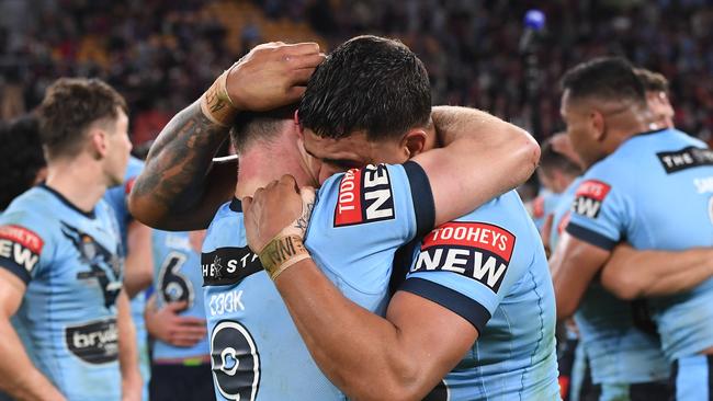 BRISBANE, AUSTRALIA - JUNE 27: Latrell Mitchell of the Blues celebrates with Damien Cook of the Blues after winning game two of the 2021 State of Origin series between the Queensland Maroons and the New South Wales Blues at Suncorp Stadium on June 27, 2021 in Brisbane, Australia. (Photo by Bradley Kanaris/Getty Images)