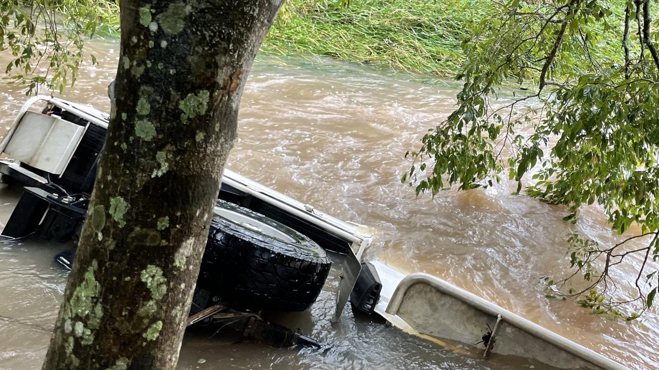 The submerged vehicle in Surprise Creek Road at Mount Ossa. A Calen woman was found inside the vehicle after it was swept off a flooded roadway about 5am on Wednesday, May 11, 2022. Picture: Max O'Driscoll