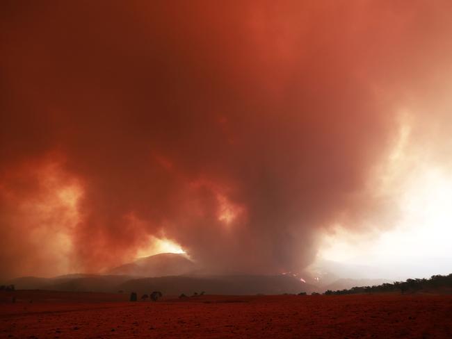 Fires are getting close to properties in the small village of Bredbo in NSW. Picture: Gary Ramage