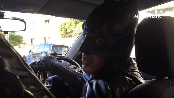 Batman Uber driver in Sydney | Daily Telegraph