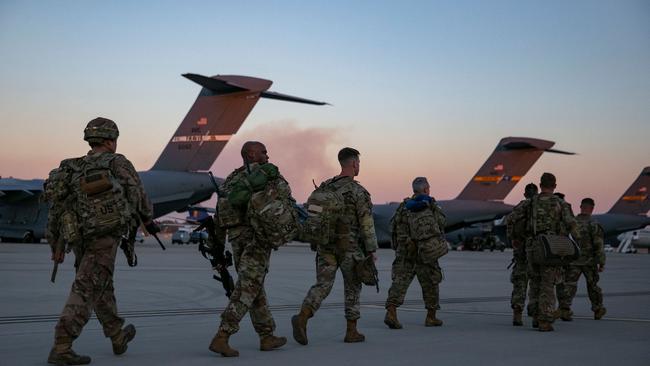 US soldiers walk to board a plane from Pope Army Airfield in Fort Bragg, North Carolina, as they are deployed to Europe, amid the escalating crisis between Russia and Ukraine. Picture: AFP