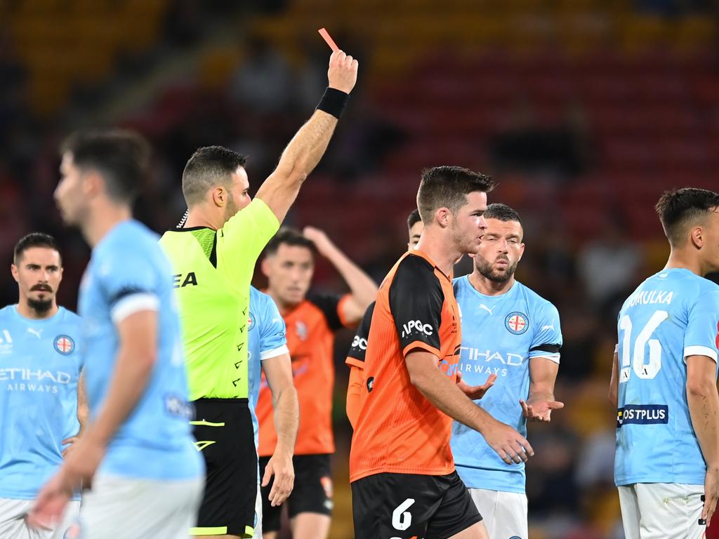 Referee Tim Danaskos shows a red card to Melbourne City’s Taras Gomulka (No.16). Picture: Albert Perez/Getty Images