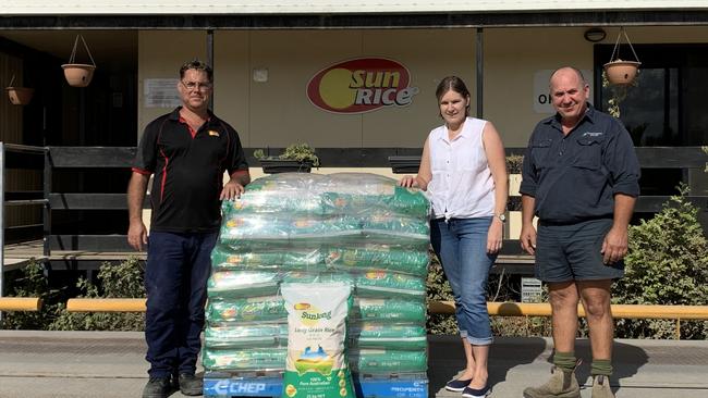 Burdekin rice growers Allan and Lynette Milan pick up approximately 1000 kilograms of donated North Queensland grown rice from SunRice’s processing facility at Brandon, near Ayr. Also pictured is SunRice’s Brandon Site Supervisor, Morne Cornish.