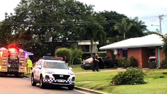 Firefighters and police at the scene where an allegedly stolen Holden Commodore crashed into a house at Tapiolas Ave, Kirwan.