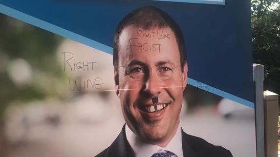 One of the defaced Josh Frydenberg posters.