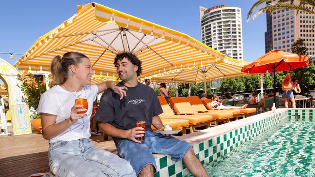 Scarlett Bibby and Daniel Hassoun enjoying the atmosphere at Arbory Afloat's Capri on the yarra river which is among the hot new bars to check out this summer. Picture: Ian Currie