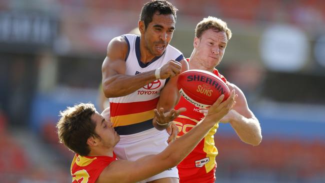 Eddie Betts is tackled during Adelaide’s clash against Gold Coast. Picture: Jerad Williams