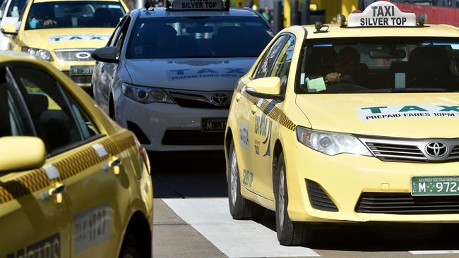 Under a loophole, taxi drivers are permitted to negotiate their own fixed fare with customers if they hail an unbooked cab. Picture: Jay Town