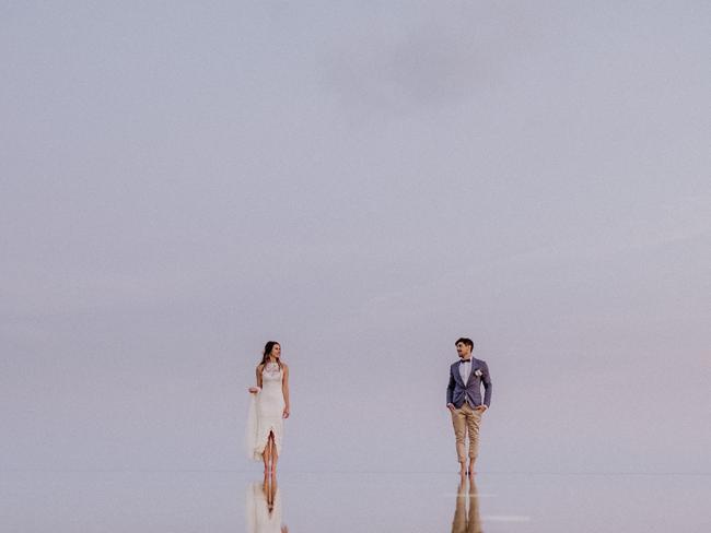 Van Middleton photographed this couple on their wedding day while walking in Pandawa, Bali, Indonesia.