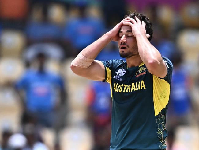 Australia's Marcus Stoinis reacts after dismissing India's Shivam Dube during the ICC men's Twenty20 World Cup 2024 Super Eight cricket match between Australia and India at Daren Sammy National Cricket Stadium in Gros Islet, Saint Lucia on June 24, 2024. (Photo by Chandan Khanna / AFP)