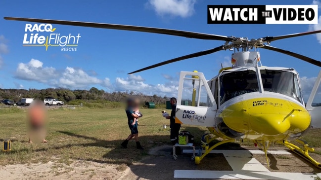 QAS rescuing 2 year old boy attacked by Dingo on Fraser Island