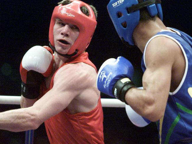 Australian 60kg Michael Katsidis (red) boxer defeats Brazilian Agnaldo Magalhaes BRA at the Sydney 2000 Olympics. Picture: Peter Ward.