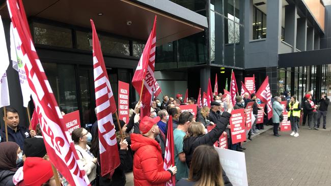 About 100 members of the United Workers Union take part in the strike. Picture: Roy Vandervegt