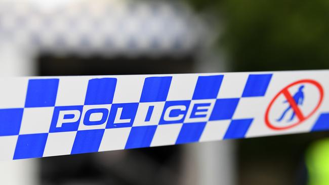 Police tape is seen after an incident at the Reservior Police station in Melbourne, Thursday, February 20, 2020. A car has rammed into the Reservior Police station. (AAP Image/James Ross) NO ARCHIVING