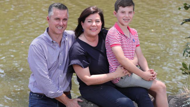 Gaven LNP candidate Kirsten Jackson with her family - husband Michael Jackson and son William Jackson 11 at Nerang. Picture Glenn Hampson.