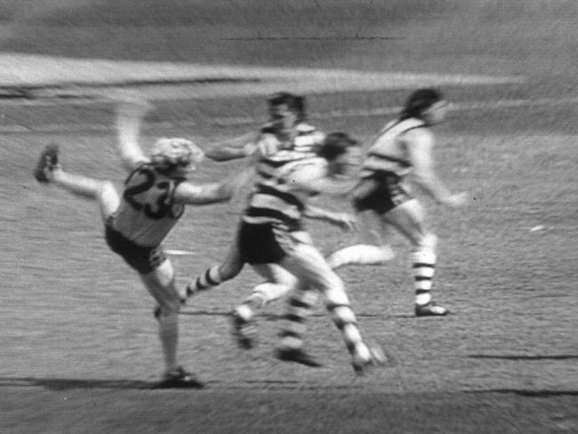 Brereton is crunched by Yeates at the opening bounce of the 1989 Grand Final.