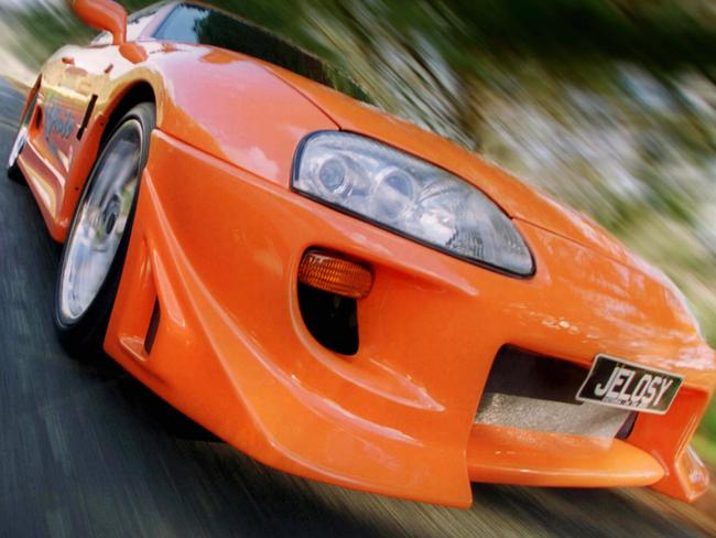 JUNE 17, 2002 : Modified Toyota Supra of Melbourne motorist Sam Ucaner with his Jelosy number plate, 17/06/02. Pic David Caird.Motor Vehicle / Car