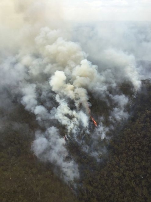 The Queensland Fire Department battled two fires in the Atherton Tablelands on Sunday, including at Silver Valley, pictured. Photo: Queensland Fire Department.