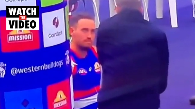 Worrying scenes of AFL star in changeroom after fainting mid-game