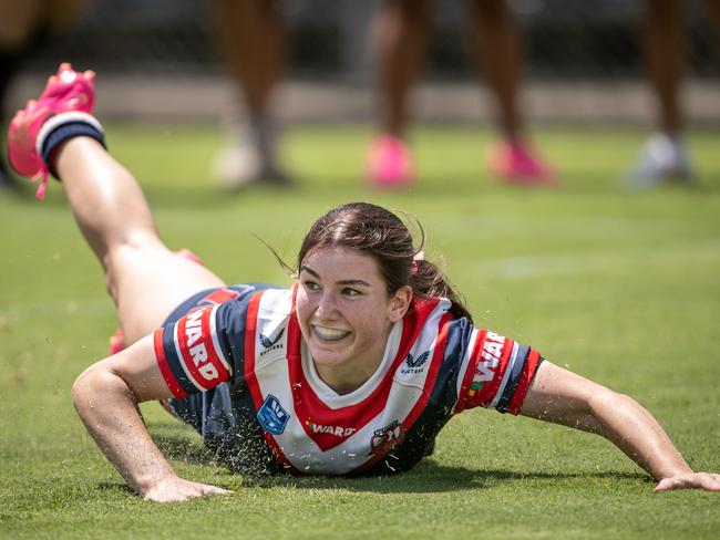 Elizabeth Macgregor is all smiles after her try. Picture: Julian Andrews