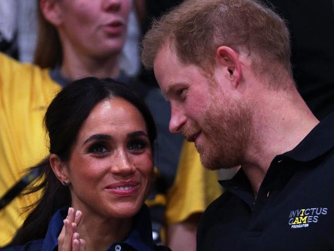 DUSSELDORF, GERMANY - SEPTEMBER 15: Meghan, Duchess of Sussex and Prince Harry, Duke of Sussex watch on during the Mixed Team Gold Medal match between Team Colombia and Team Poland during day six of the Invictus Games DÃÂ¼sseldorf 2023 on September 15, 2023 in Duesseldorf, Germany. (Photo by Dean Mouhtaropoulos/Getty Images for Invictus Games DÃÂ¼sseldorf 2023)