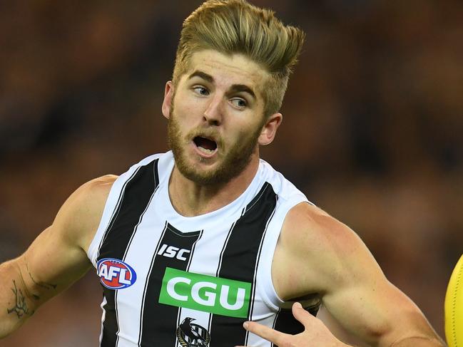 Sam Murray of the Magpies is seen in action during the Round 3 AFL match between the Carlton Blues and the Collingwood Magpies at the MCG in Melbourne, Friday, April 6, 2018. (AAP Image/Julian Smith) NO ARCHIVING, EDITORIAL USE ONLY